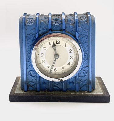 Lot 810 - A French Art Deco blue glass mantel timepiece,...