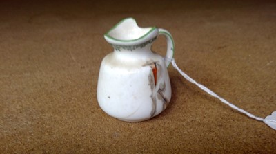 Lot 805 - A Royal Doulton cricket series ware small jug,...