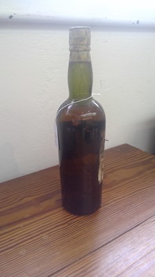 Lot 22 - A bottle of vintage whisky, indistinctly...