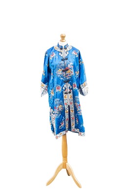 Lot 203 - A Chinese blue silk embroidered robe, early...