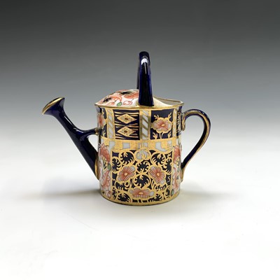 Lot 807 - A Royal Crown Derby model of a watering can....