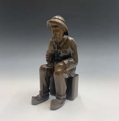 Lot 359 - A carved wood model of Jersey Fisherman,...