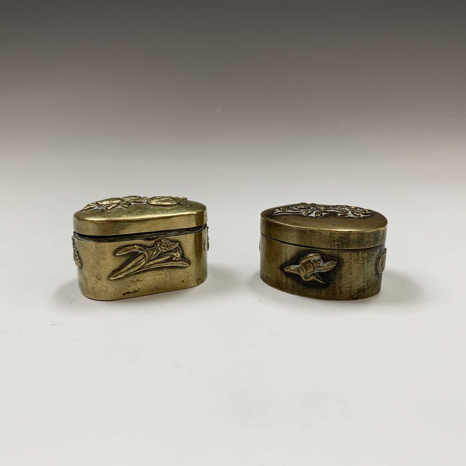 Lot 150 - Two Japanese brass pill boxes, early 20th...