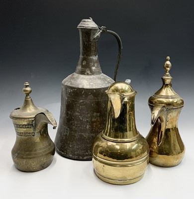 Lot 1000 - Two Saudi Arabian brass dallah pots, 19th...