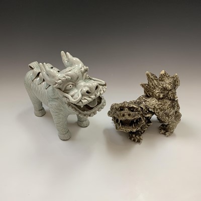 Lot 159 - A Chinese celadon glazed pottery dog of fo,...