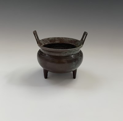 Lot 160 - A Japanese cast iron circular censer and cover,...
