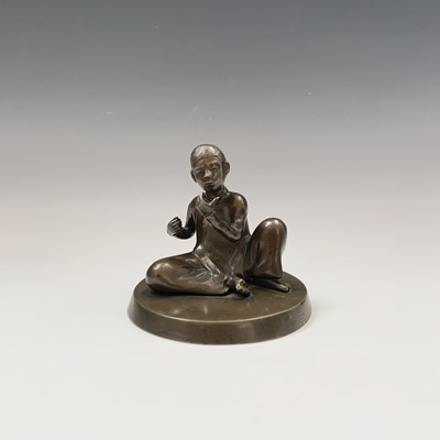 Lot 161 - A Japanese bronze figure of a seated boy,...