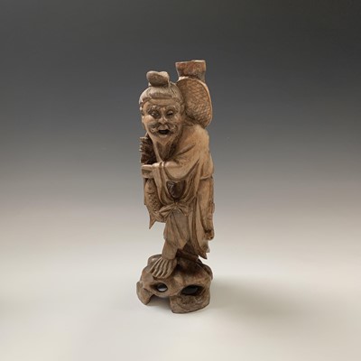 Lot 156 - A large Chinese soapstone figure of a...