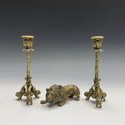 Lot 109 - A pair of late 19th century brass candlesticks,...