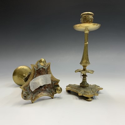 Lot 256 - A pair of 19th century cast brass candlesticks,...