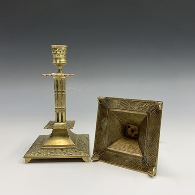 Lot 256 - A pair of 19th century cast brass candlesticks,...