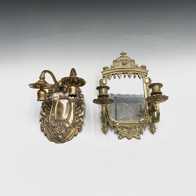 Lot 132 - A Continental brass double wall sconce, circa...
