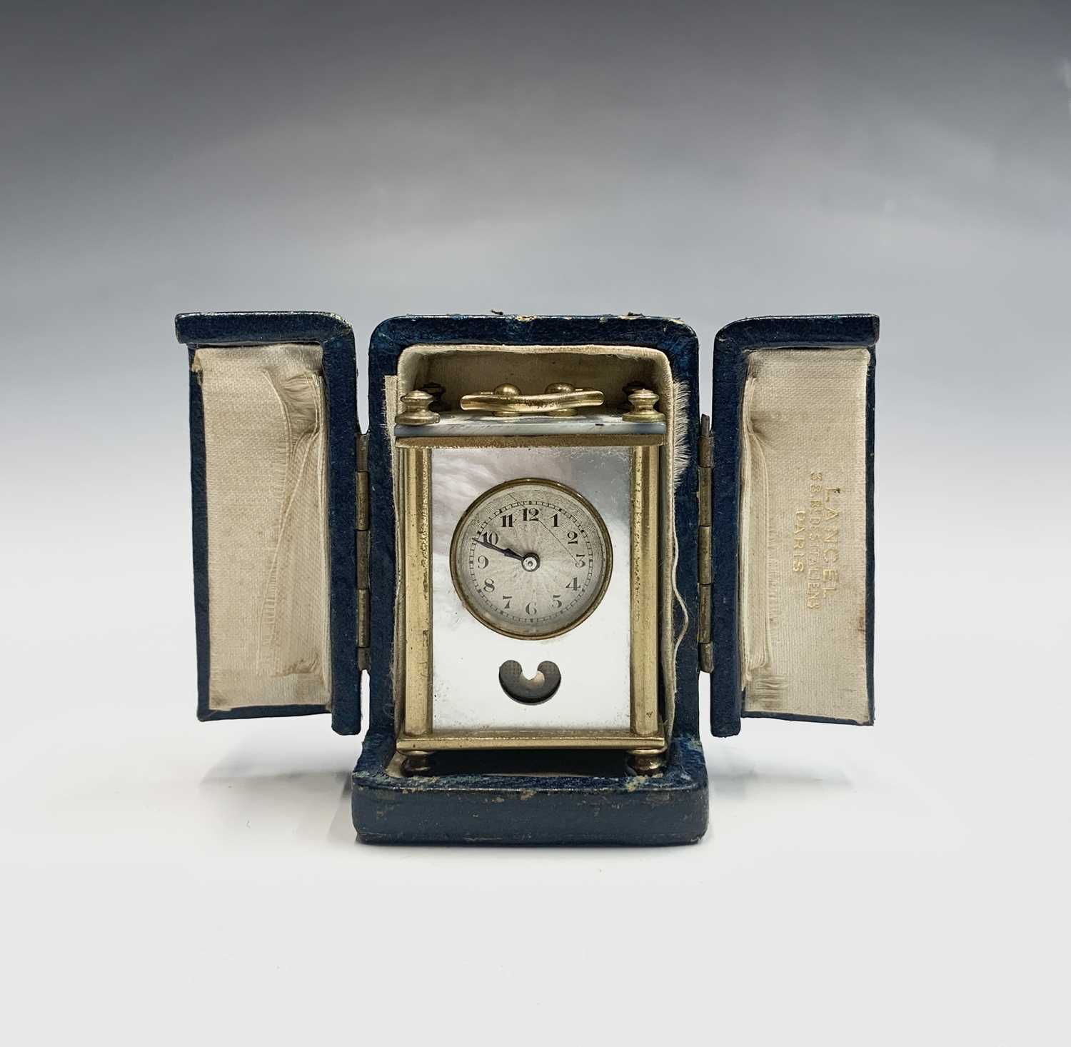 Lot 20 - A French miniature alarm clock, with dummy...
