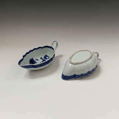 Lot 162 - A near pair of Chinese export blue and white...