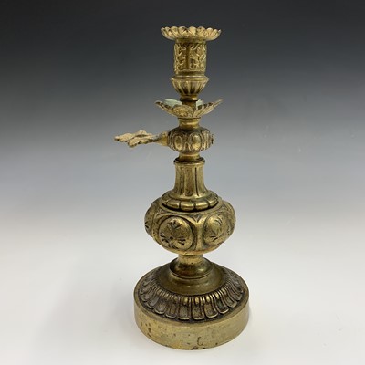 Lot 154 - A late Victorian tall brass twist candlestick,...