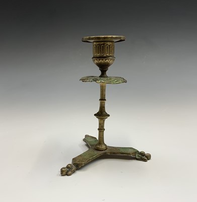 Lot 154 - A late Victorian tall brass twist candlestick,...
