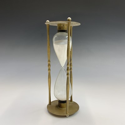 Lot 154 - A late Victorian tall brass twist candlestick,...