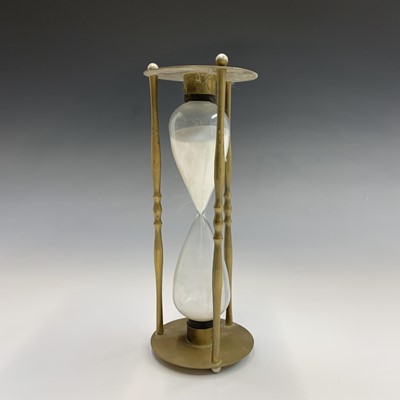 Lot 154 - A late Victorian tall brass twist candlestick,...