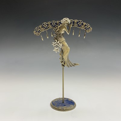 Lot 154 - A late Victorian tall brass twist candlestick,...