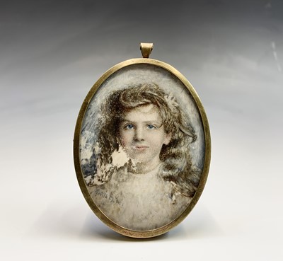 Lot 392 - A miniature portrait of a girl.