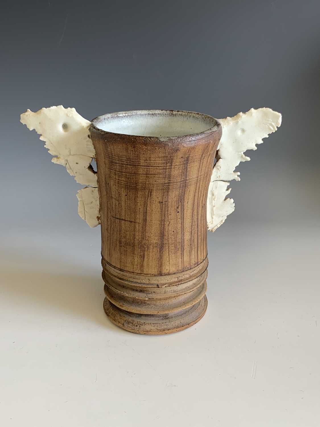 Lot 510 - A winged studio pottery vessel possibly by...