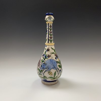 Lot 354 - A Persian pottery bottle vase, circa 1900, the...