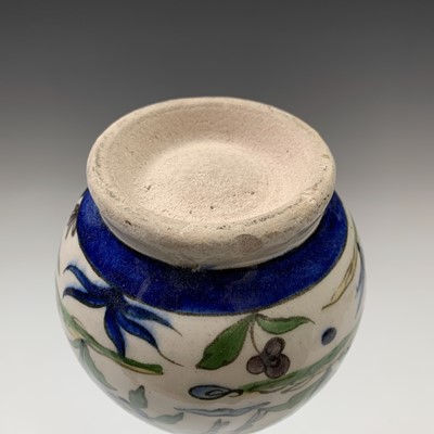 Lot 354 - A Persian pottery bottle vase, circa 1900, the...