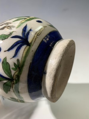 Lot 354 - A Persian pottery bottle vase, circa 1900, the...