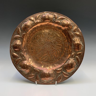Lot 58 - An Arts and Crafts period copper charger, the...