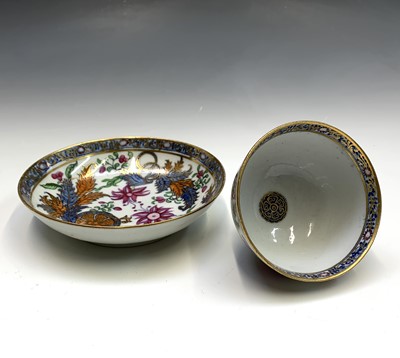 Lot 883 - A Newhall porcelain tea bowl and saucer, circa...