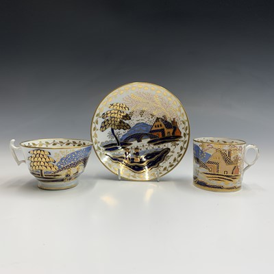 Lot 885 - A Coalport cup and saucer, painted and gilt in...