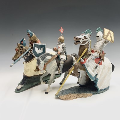 Lot 101 - Three models of knights on horseback. Tallest...