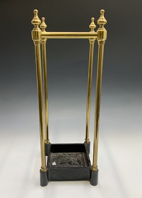 Lot 282 - A brass four section umbrella or stick stand...