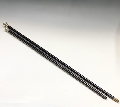 Lot 97 - A Victorian ebony walking cane, with silver...