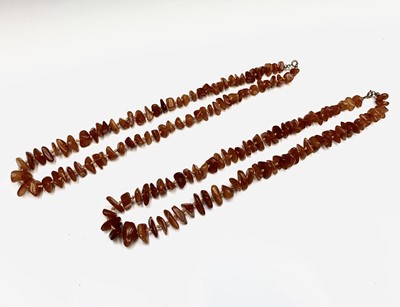 Lot 468 - Two amber necklaces 64gm.