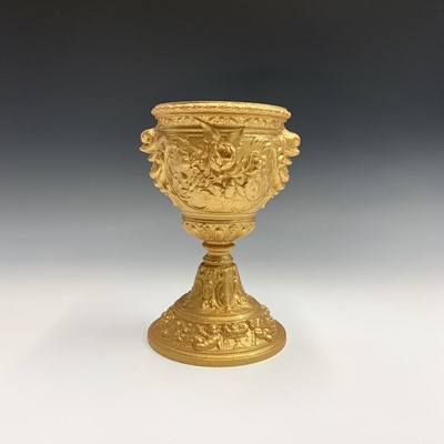 Lot 172 - A gold painted spelter chalice cast with...