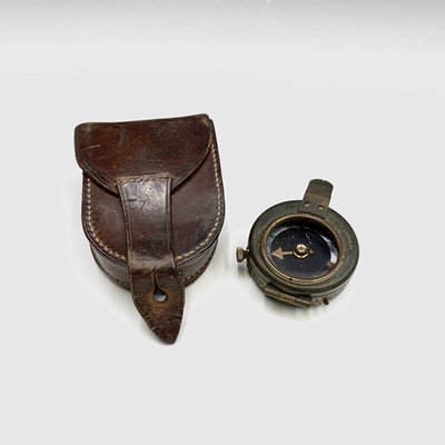 Lot 68 - A World war I marching compass, the leather...