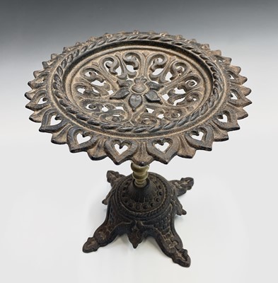 Lot 69 - A 19th century cast iron and brass trivet or...