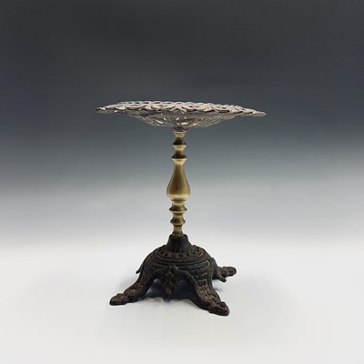 Lot 69 - A 19th century cast iron and brass trivet or...