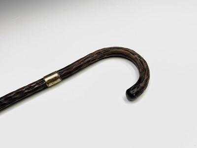 Lot 80 - A gnarled hawthorn walking stick, with gilt...