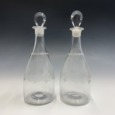 Lot 927 - A pair of Regency glass decanters, with...