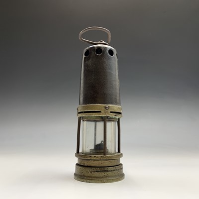 Lot 91 - A Brass and steel miner's lamp, early 20th...
