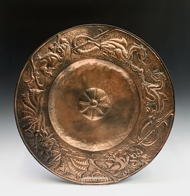 Lot 107 - An Arts and Crafts copper charger, with a...