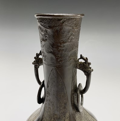 Lot 320 - A Chinese bronze bottle vase, probably Ming,...