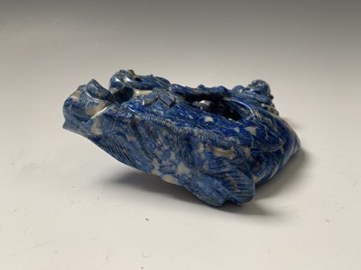 Lot 110 - A Chinese lapis lazuli carving of a boy on a...