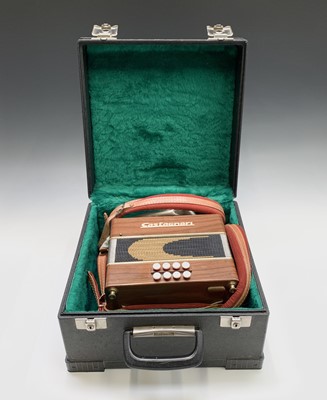 Lot 319 - A Castagnari Tommy Melodeon, with walnut...