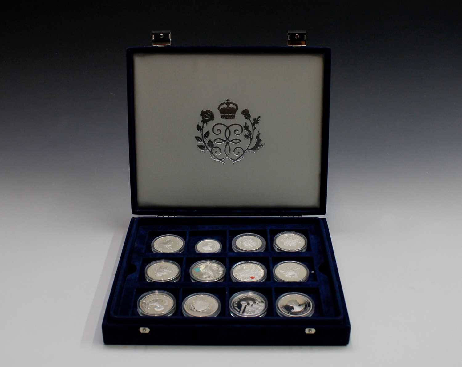 Lot 16 - Silver proof coins - 14 crown size including...