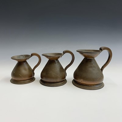 Lot 149 - Three Victorian graduated copper measures,...