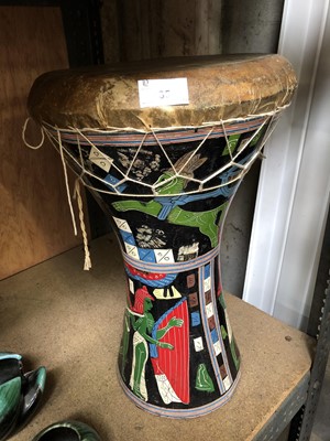 Lot 35 - A hand painted African drum.