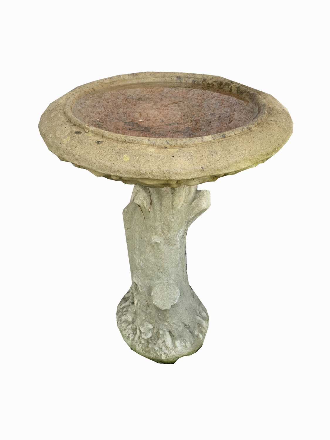 Lot 2030 - A reconstituted stone bird bath on cast tree...